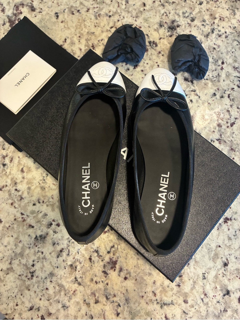 CHANEL Black Leather Ballet Flats with White Cap Toe and Bow - Picture 8 of 10